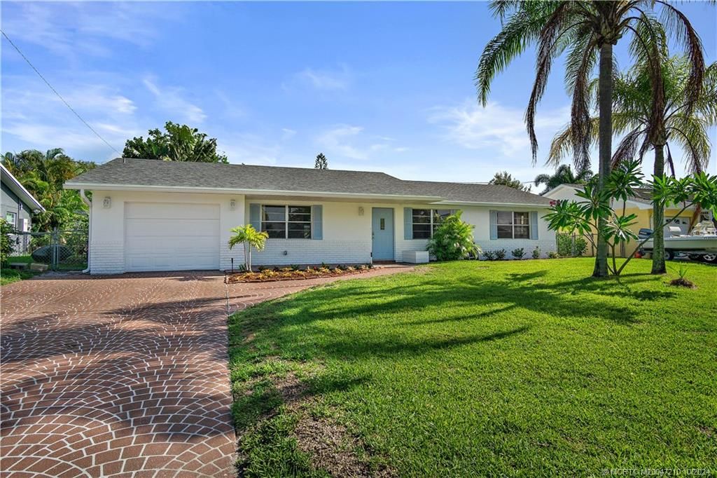Photo of 1838 NE 21st Terrace, Jensen Beach, FL 34957 (MLS # M20047210)