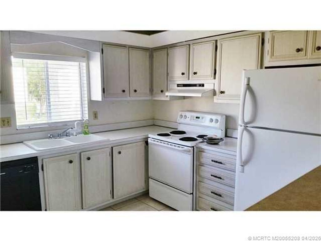 Photo of 1510 NE 12th Terrace #E13, Jensen Beach, FL 34957 (MLS # M20055208)