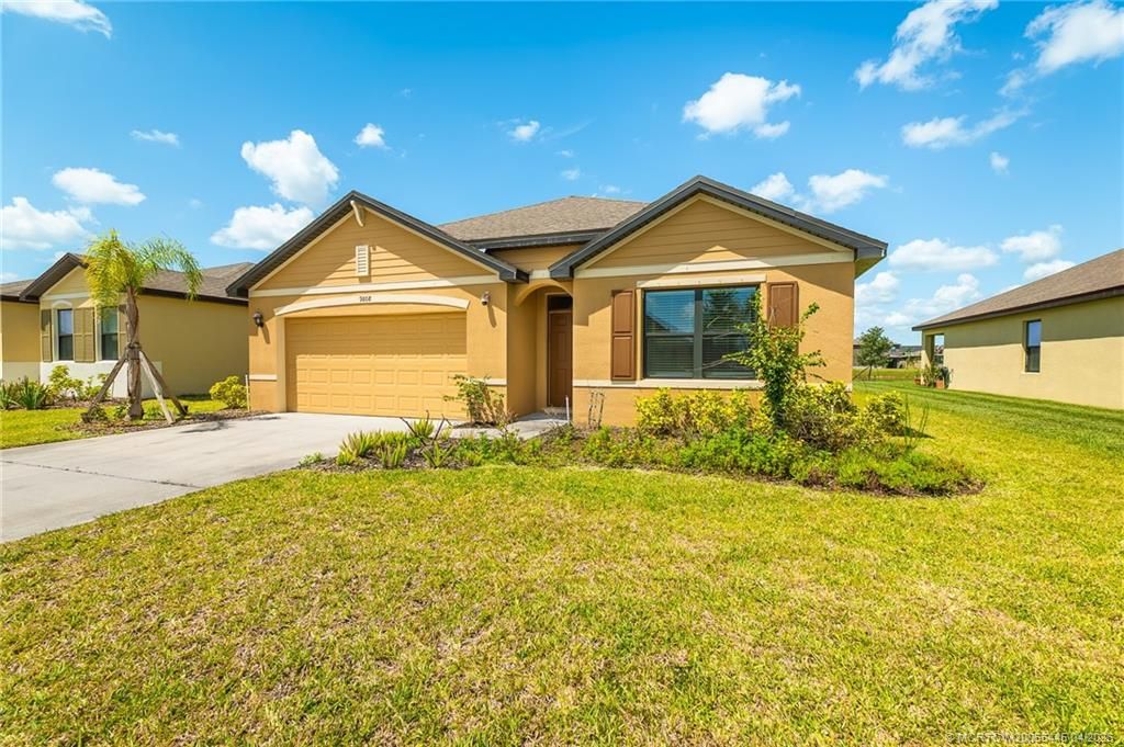 Photo of 9808 SW Triton Way, Port Saint Lucie, FL 34987 (MLS # M20055445)