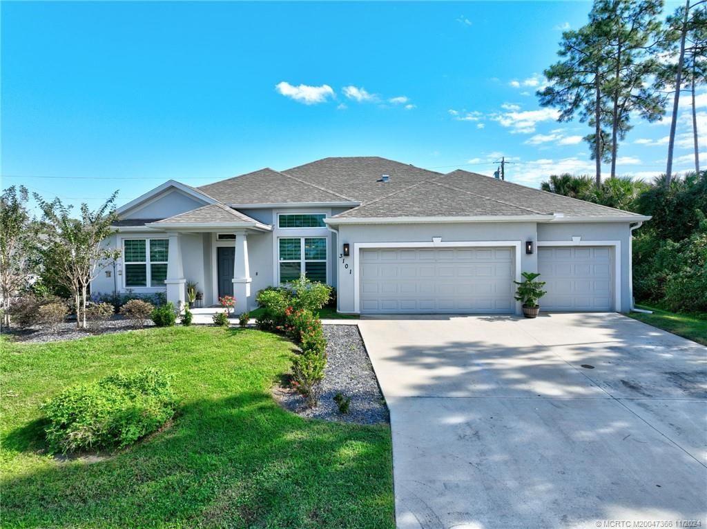 Photo of 3101 SW Armucher Street, Port Saint Lucie, FL 34953 (MLS # M20047366)