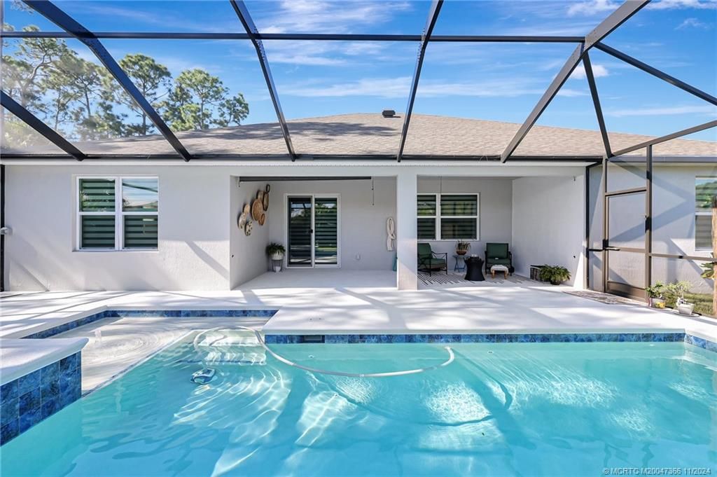 Photo of 3101 SW Armucher Street, Port Saint Lucie, FL 34953 (MLS # M20047366)