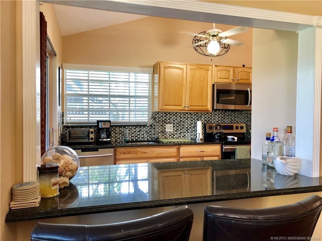 Photo of 1451 NE 14th Court #S43, Jensen Beach, FL 34957 (MLS # M20039306)