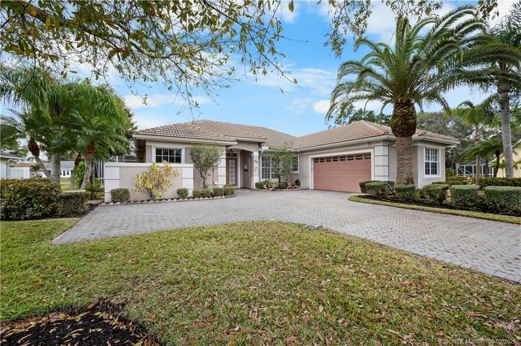 Photo of 1081 SW Sand Oak Drive, Palm City, FL 34990 (MLS # M20048700)