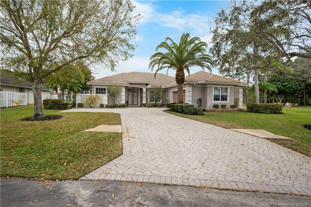 Photo of 1081 SW Sand Oak Drive, Palm City, FL 34990 (MLS # M20048700)