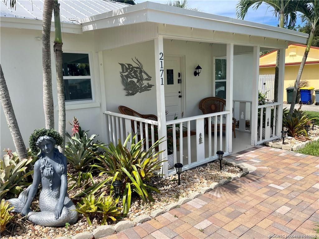 Photo of 2171 NE Pelican Terrace, Jensen Beach, FL 34957 (MLS # M20048374)