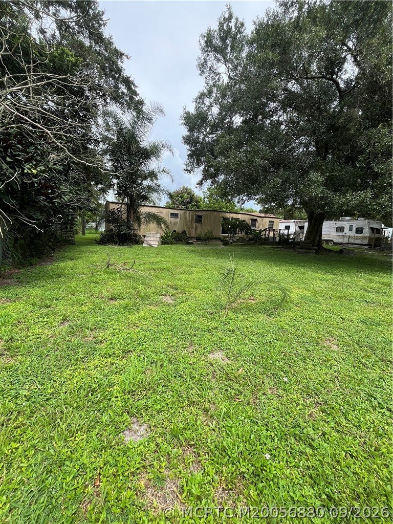 Photo of 1183 SW Pinetree Trail, Stuart, FL 34997 (MLS # M20056880)