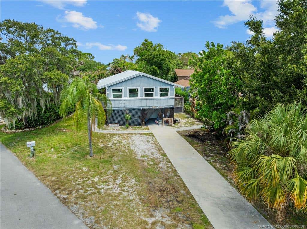 Photo of 3027 SW Cedar Trail, Palm City, FL 34990 (MLS # M20056020)