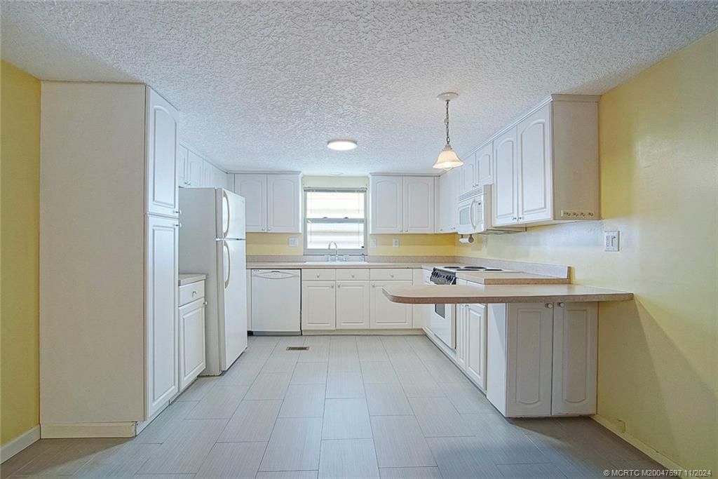 Photo of 609 Garden View, Jensen Beach, FL 34957 (MLS # M20047597)