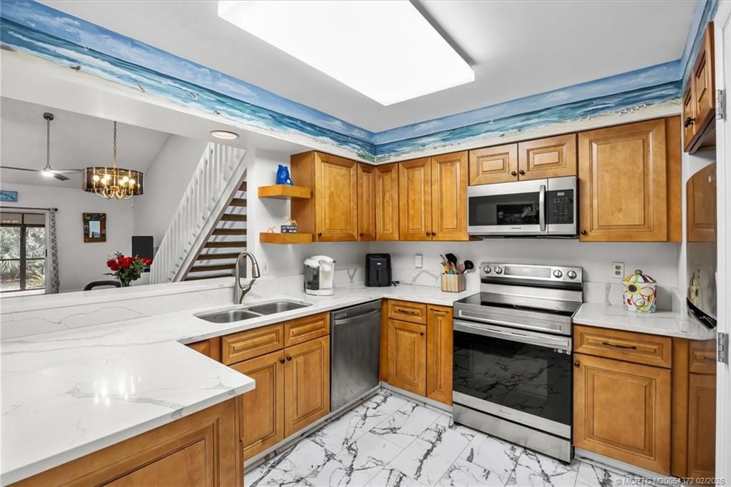 Photo of 933 NE Sandalwood Place, Jensen Beach, FL 34957 (MLS # M20054372)