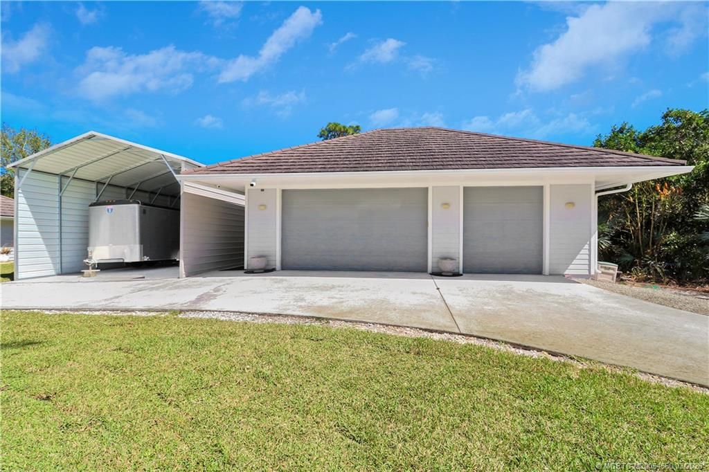 Photo of 815 NE Stokes Terrace, Jensen Beach, FL 34957 (MLS # M20054660)