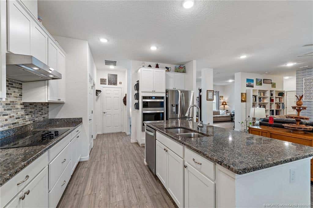 Photo of 2172 SE South Buttonwood Drive, Port Saint Lucie, FL 34952 (MLS # M20054259)