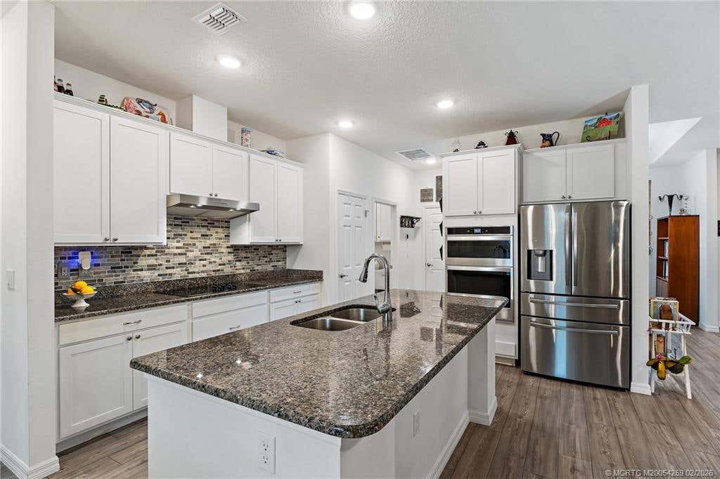Photo of 2172 SE South Buttonwood Drive, Port Saint Lucie, FL 34952 (MLS # M20054259)