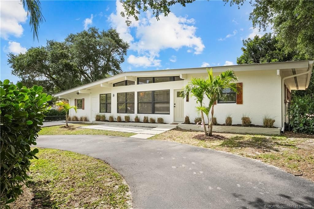 Photo of 1944 NE Lake Place, Jensen Beach, FL 34957 (MLS # M20055191)