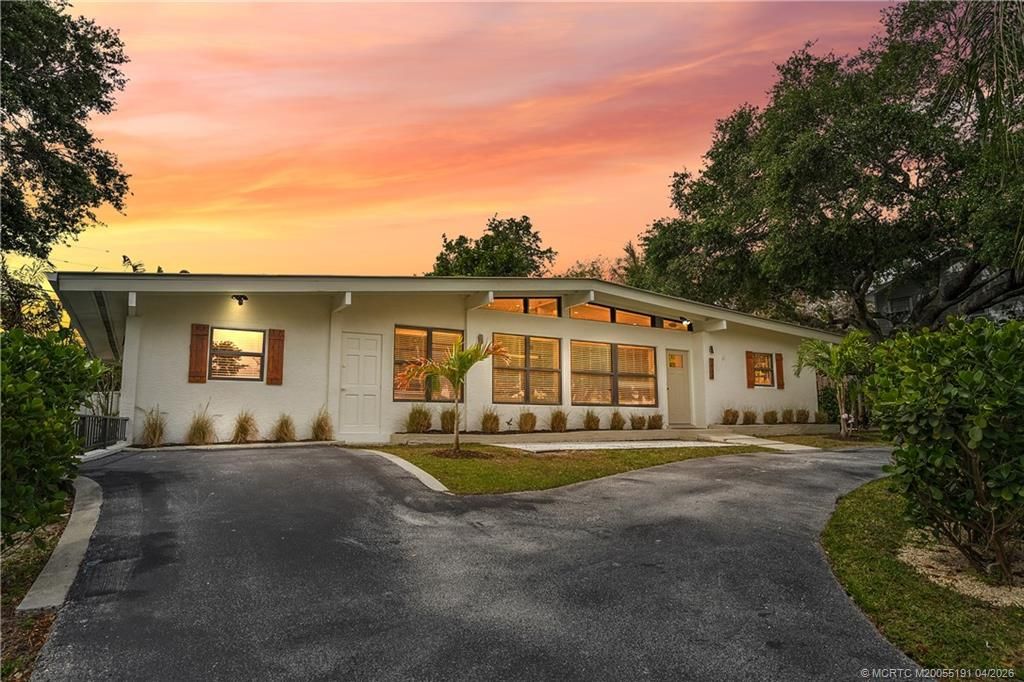 Photo of 1944 NE Lake Place, Jensen Beach, FL 34957 (MLS # M20055191)