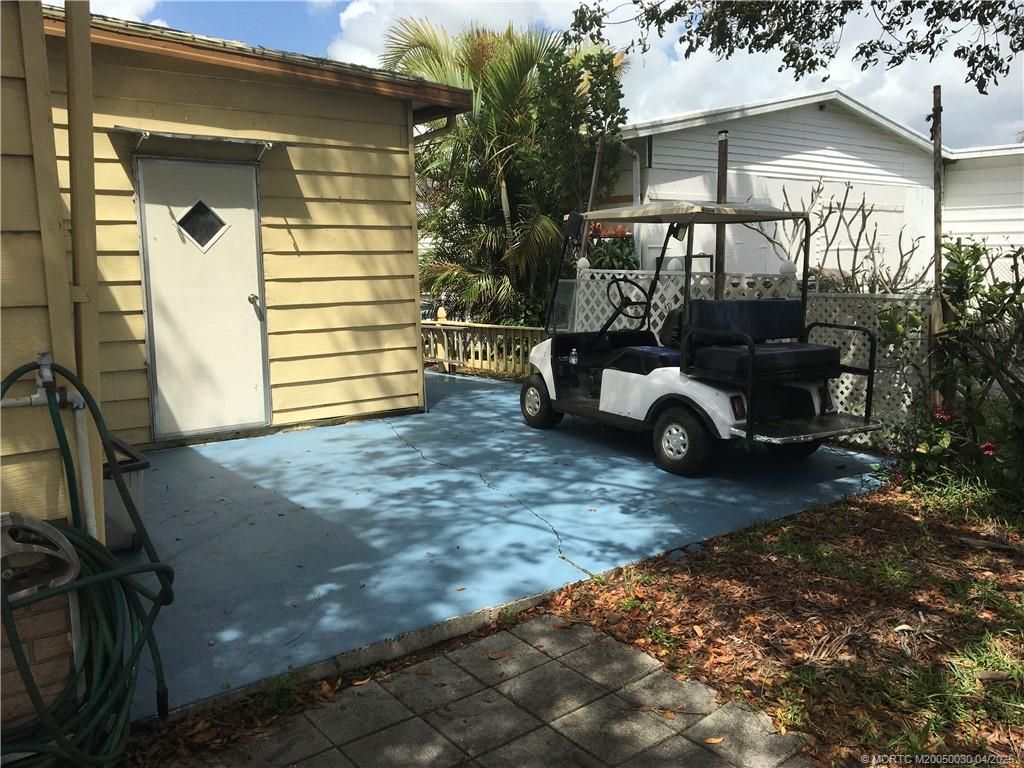 Photo of 14371 SW Divot Drive Drive, Indiantown, FL 34956 (MLS # M20050030)