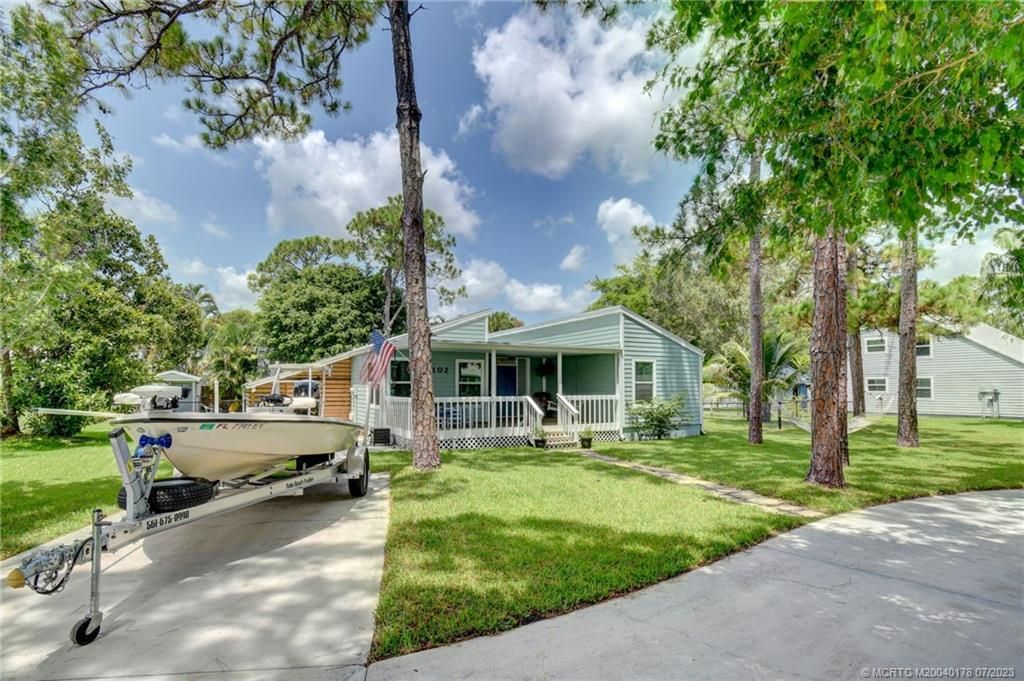 Photo of 1102 SW Pine Tree Lane, Palm City, FL 34990 (MLS # M20040178)