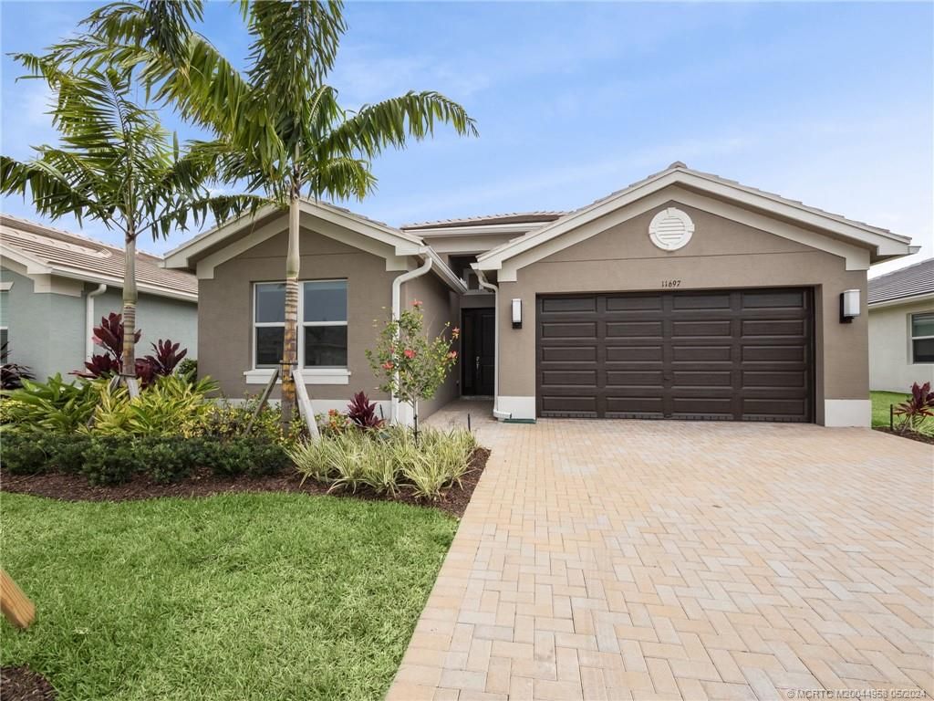 Photo of 11697 SW Oceanus Boulevard, Port Saint Lucie, FL 34987 (MLS # M20044958)