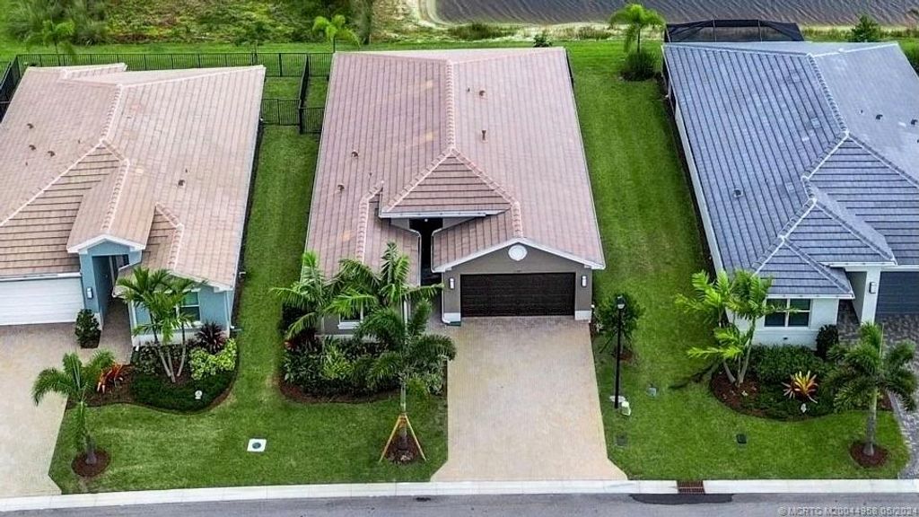 Photo of 11697 SW Oceanus Boulevard, Port Saint Lucie, FL 34987 (MLS # M20044958)