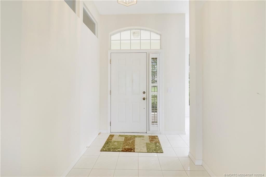 Photo of 1676 SW Monarch Club Drive, Palm City, FL 34990 (MLS # M20047087)