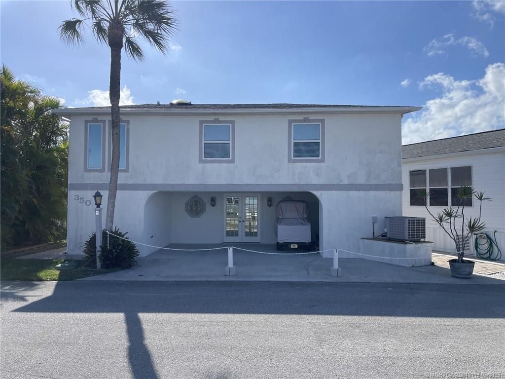 Photo of 350 Nettles Boulevard, Jensen Beach, FL 34957 (MLS # M20049113)