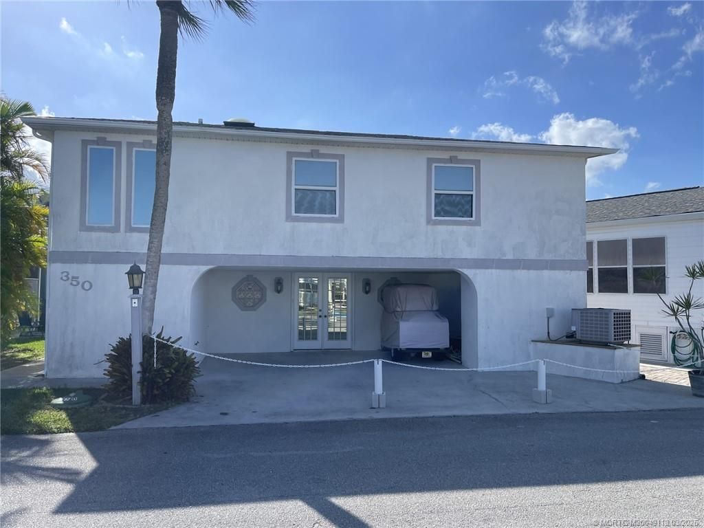 Photo of 350 Nettles Boulevard, Jensen Beach, FL 34957 (MLS # M20049113)