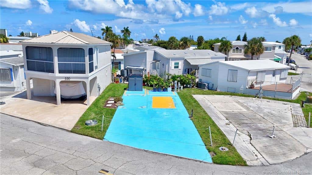 Photo of 529 Nettles Boulevard, Jensen Beach, FL 34957 (MLS # M20056388)