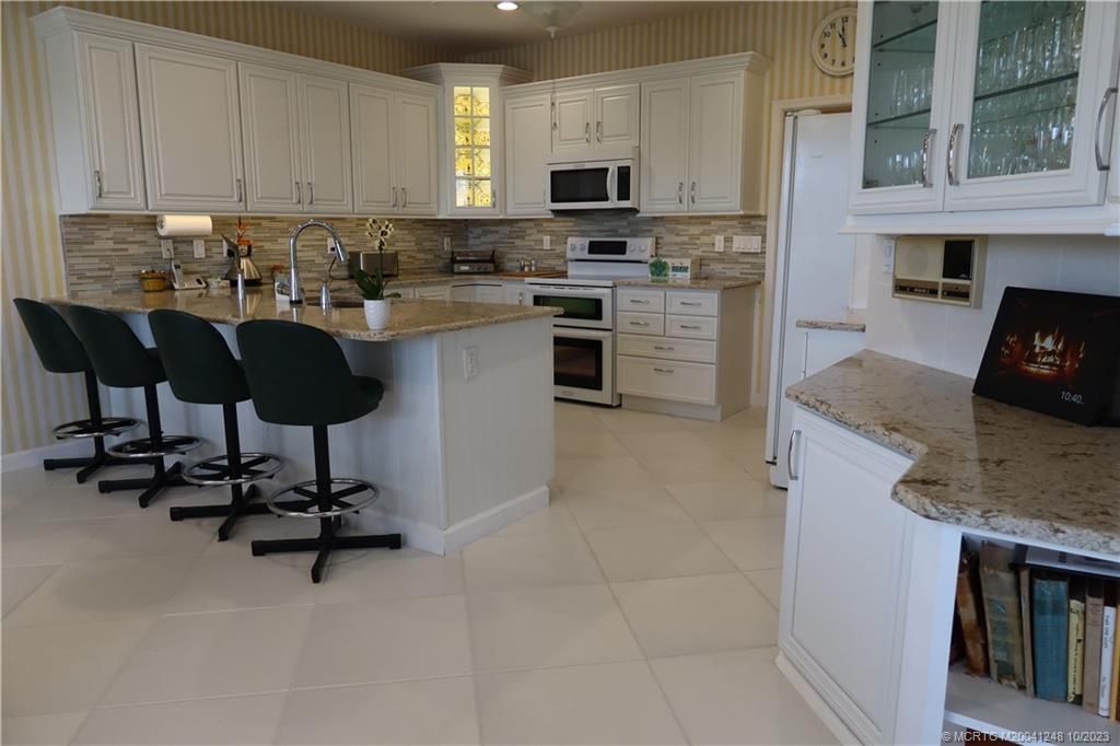 Photo of 3488 SE Cambridge Drive, Stuart, FL 34997 (MLS # M20041248)