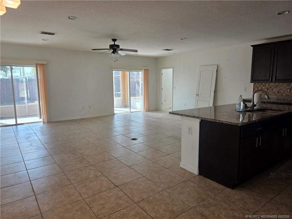 Photo of 3918 SW Kakopo Street, Port Saint Lucie, FL 34953 (MLS # M20054928)
