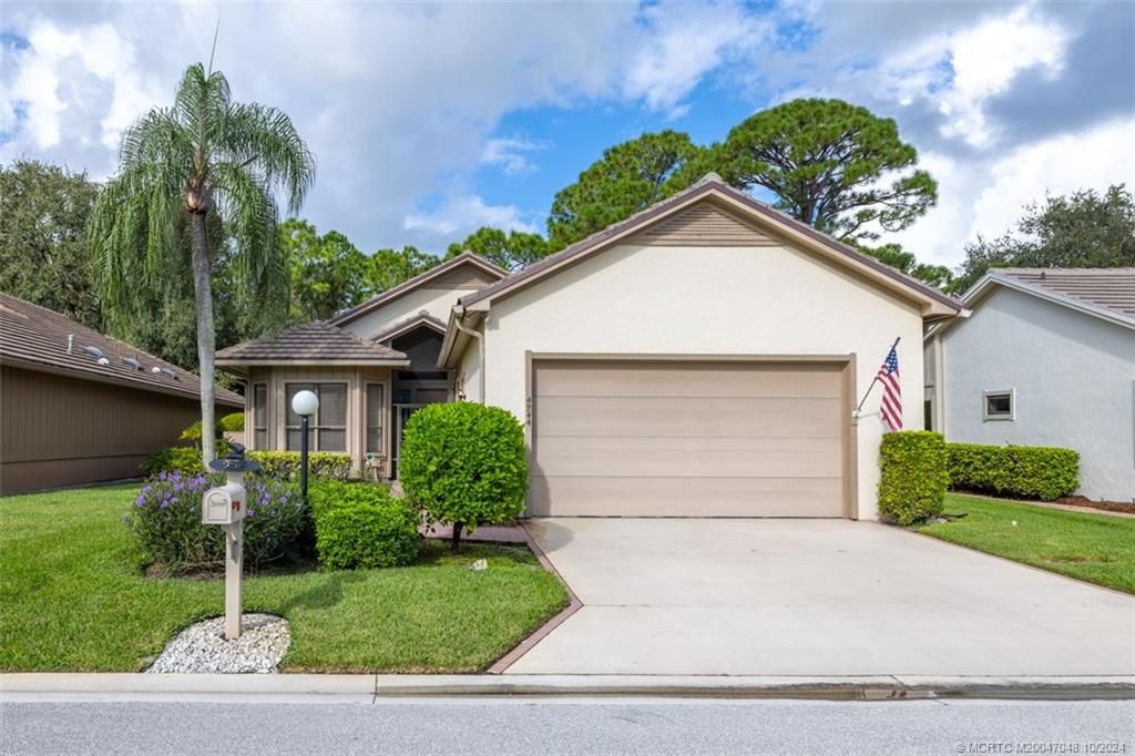 Photo of 4244 SW Mallard Creek Trail, Palm City, FL 34990 (MLS # M20047048)