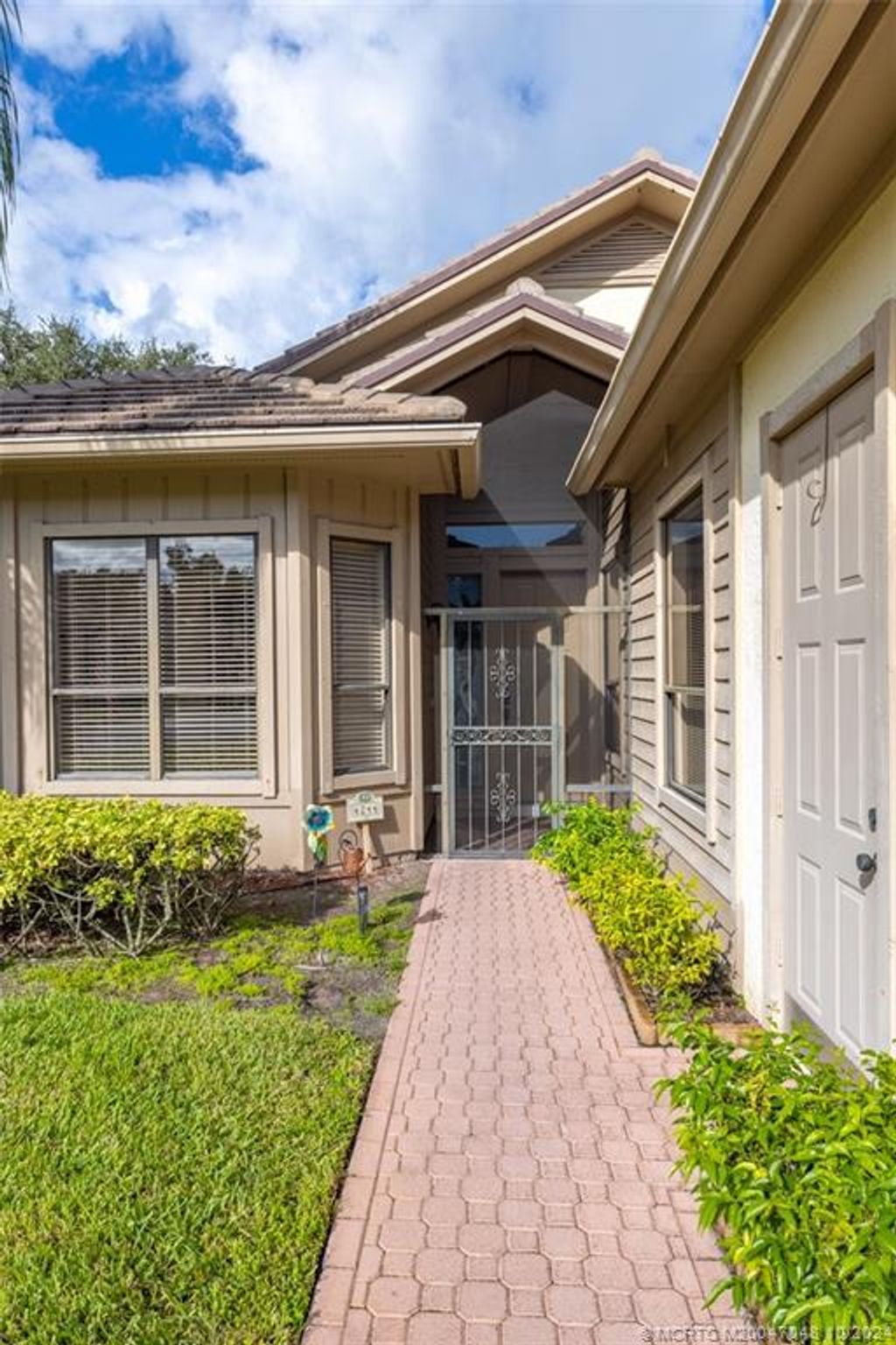 Photo of 4244 SW Mallard Creek Trail, Palm City, FL 34990 (MLS # M20047048)