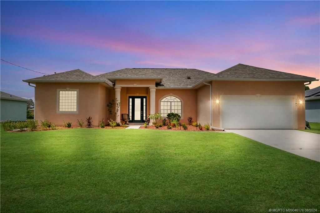 Photo of 1141 SW Ackard Avenue, Port Saint Lucie, FL 34953 (MLS # M20046178)