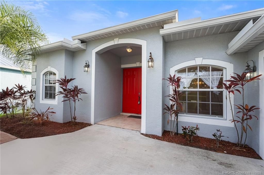 Photo of 510 NW Fetterbush Way, Jensen Beach, FL 34957 (MLS # M20053068)