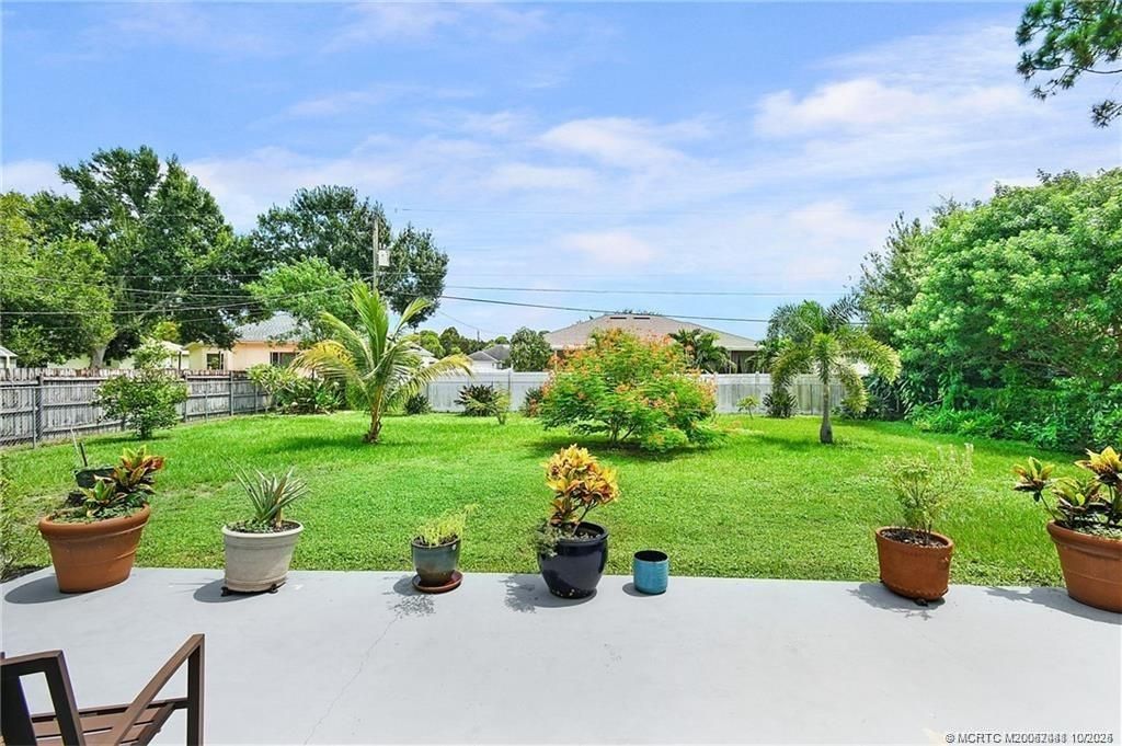 Photo of 3171 SW Crumpacker Street, Port Saint Lucie, FL 34953 (MLS # M20052488)