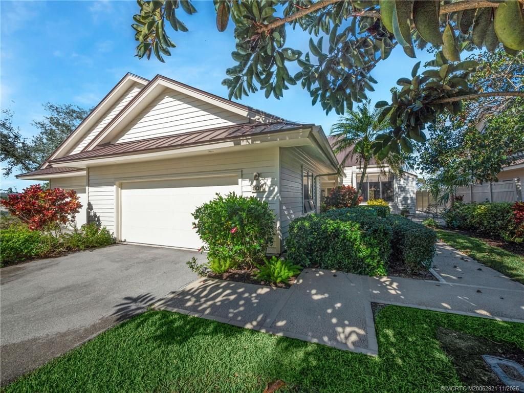 Photo of 5011 SE Brandywine Way, Stuart, FL 34997 (MLS # M20052921)