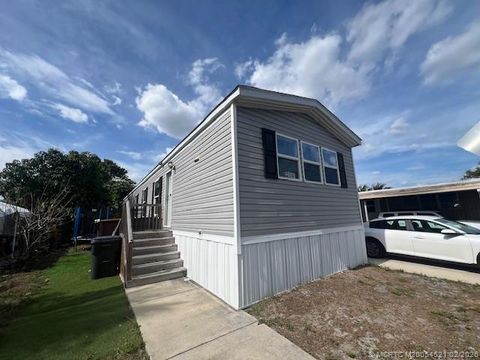 Photo of 3081 E Mayaguana Lane, Lake Worth, FL 33462 (MLS # M20054521)