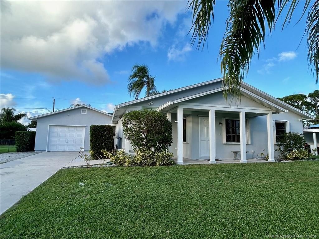 Photo of 1685 SE Grapeland Avenue, Port Saint Lucie, FL 34952 (MLS # M20047445)