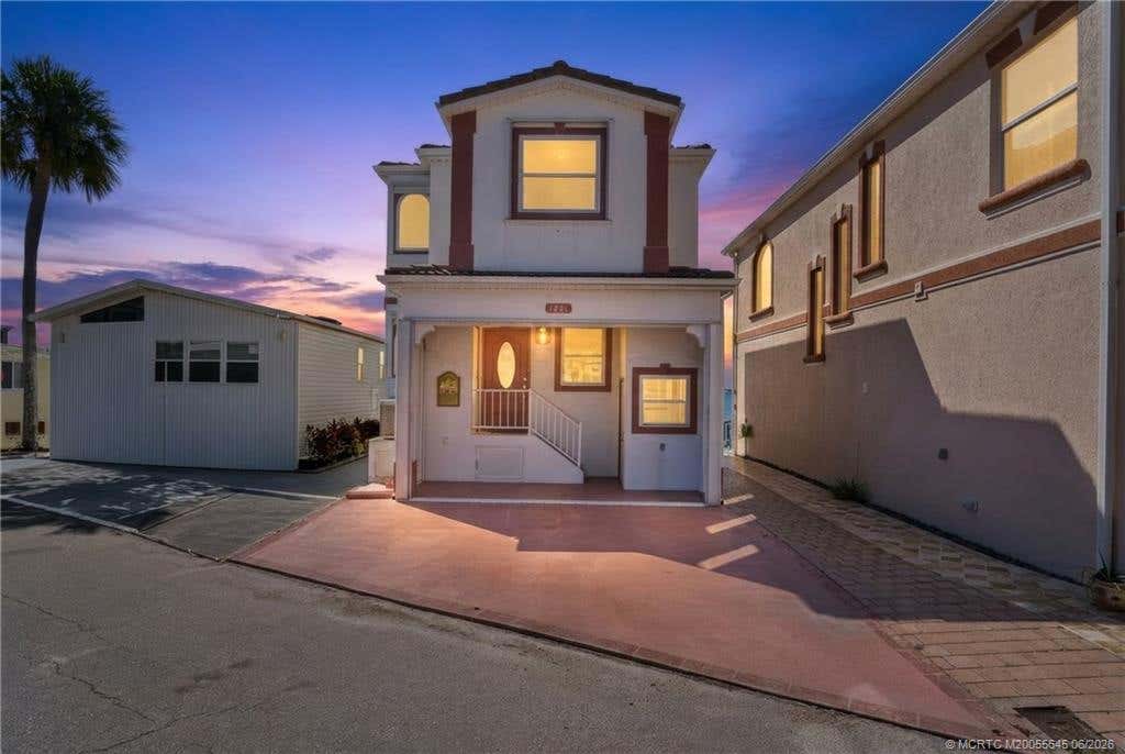 Photo of 1251 Nettles Boulevard, Jensen Beach, FL 34957 (MLS # M20055645)