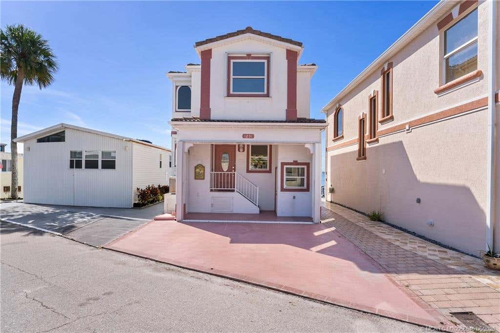 Photo of 1251 Nettles Boulevard, Jensen Beach, FL 34957 (MLS # M20055645)