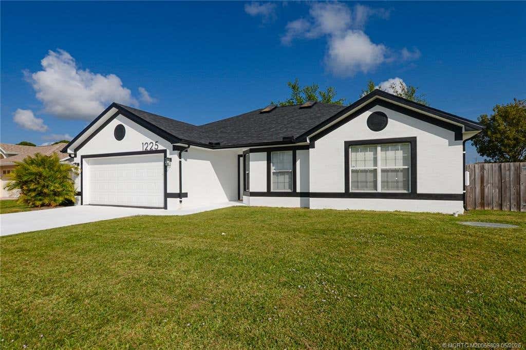 Photo of 1225 SW Hunnicut Avenue SW, Port Saint Lucie, FL 34953 (MLS # M20055809)
