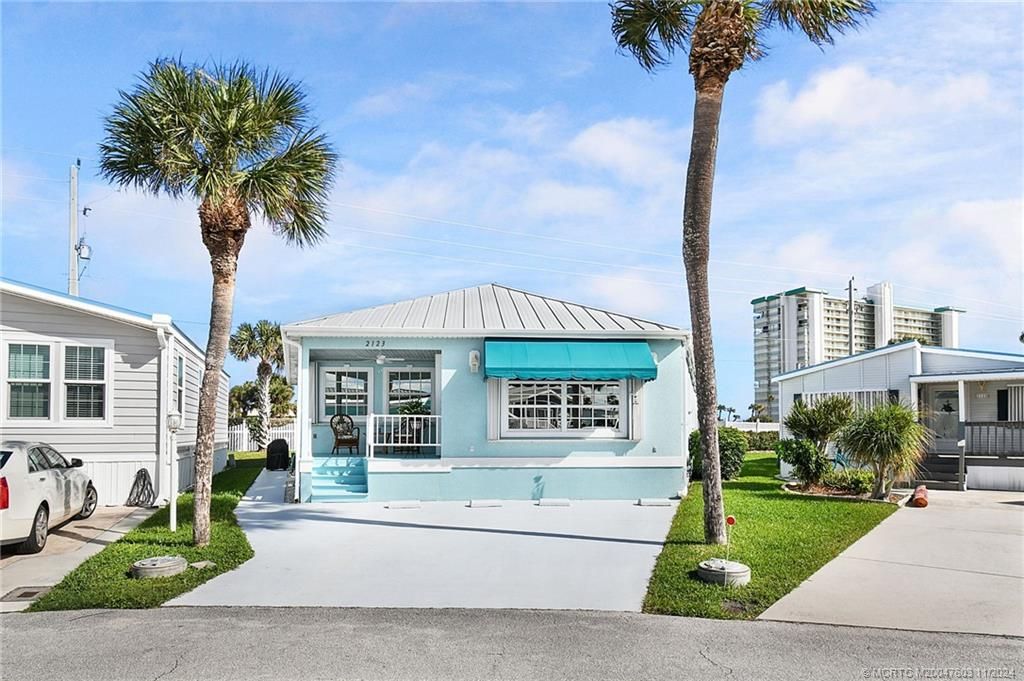 Photo of 2123 Nettles Boulevard, Jensen Beach, FL 34957 (MLS # M20047603)