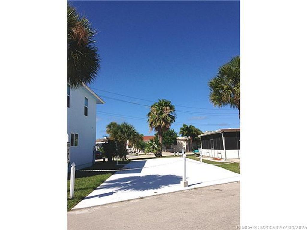 Photo of 797 Nettles Boulevard, Jensen Beach, FL 34957 (MLS # M20050262)