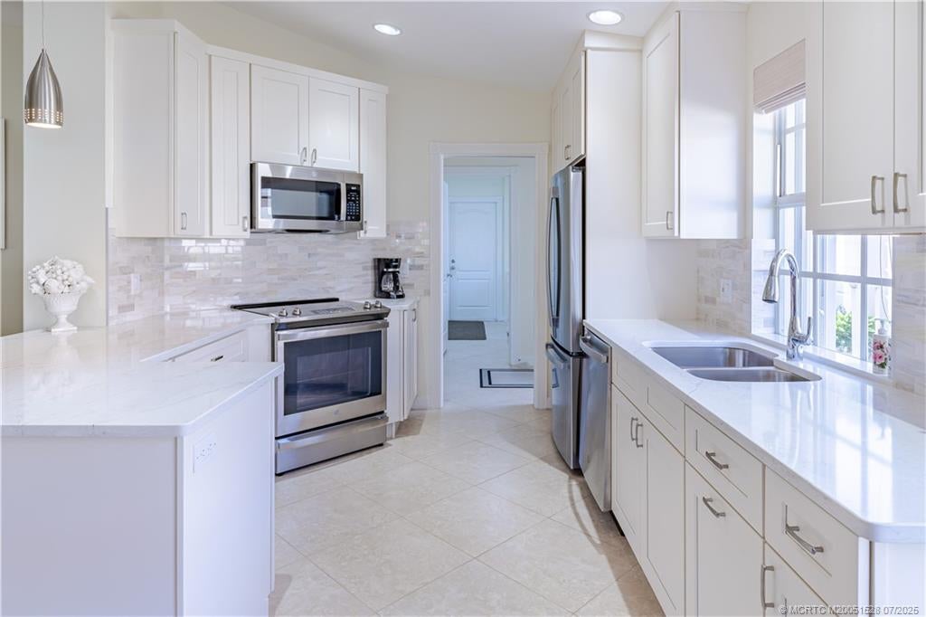 Photo of 1759 Shady Lake Terrace, Palm City, FL 34990 (MLS # M20051528)