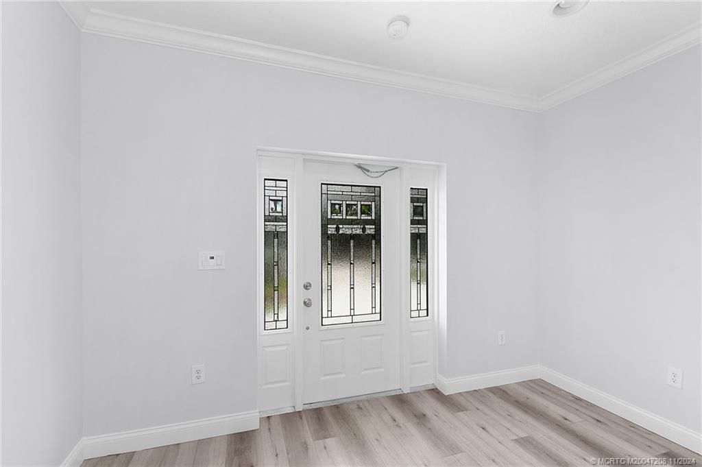 Photo of 1005 SW All American Boulevard, Palm City, FL 34990 (MLS # M20047208)