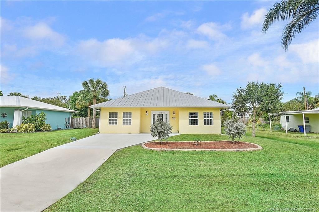 Photo of 1005 SW All American Boulevard, Palm City, FL 34990 (MLS # M20047208)