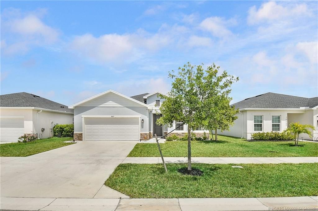 Photo of 10663 SW Vasari Way, Port Saint Lucie, FL 34987 (MLS # M20050164)