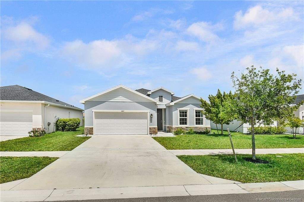 Photo of 10663 SW Vasari Way, Port Saint Lucie, FL 34987 (MLS # M20050164)