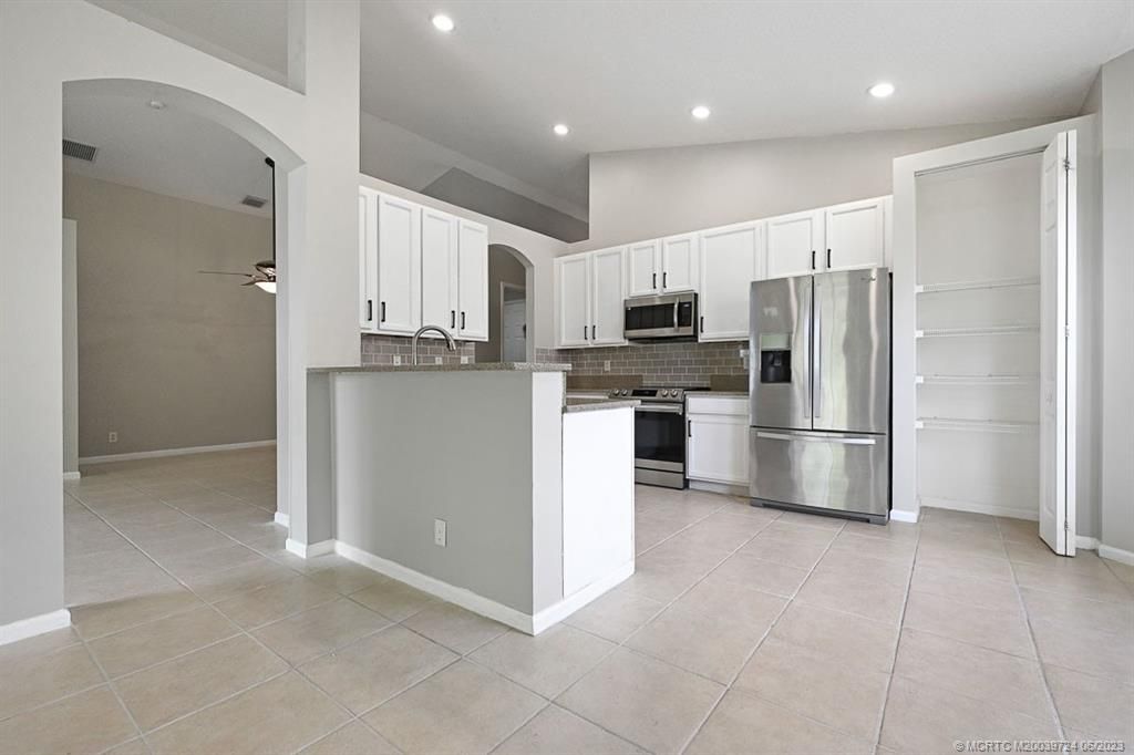 Photo of 1477 SE Legacy Cove Circle, Stuart, FL 34997 (MLS # M20039724)