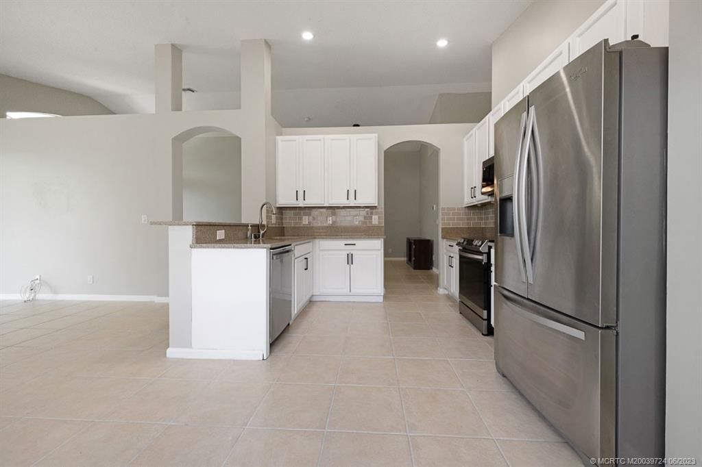 Photo of 1477 SE Legacy Cove Circle, Stuart, FL 34997 (MLS # M20039724)