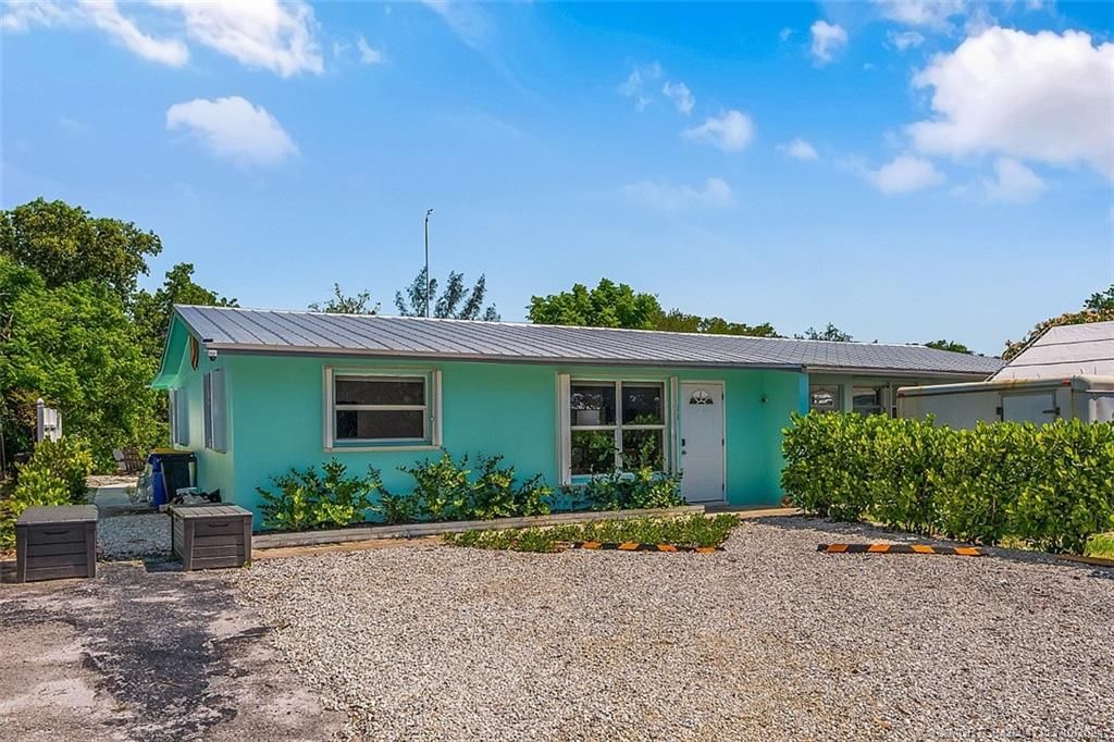 Photo of 30 SW Hideaway Place, Stuart, FL 34994 (MLS # M20047113)