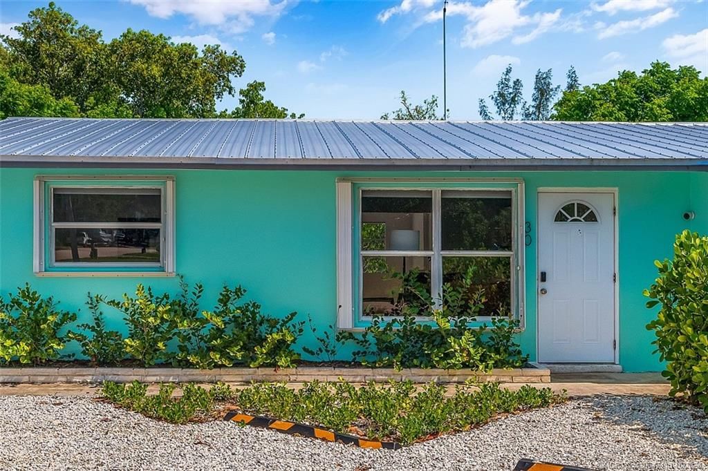 Photo of 30 SW Hideaway Place, Stuart, FL 34994 (MLS # M20047113)